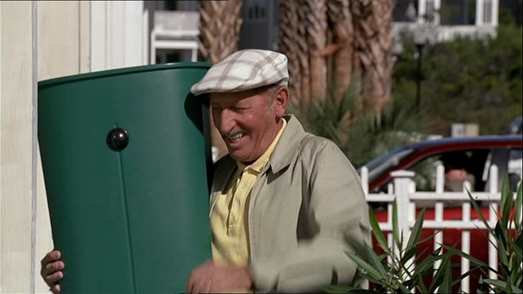 Le voisin de Truman le filmant à son insu